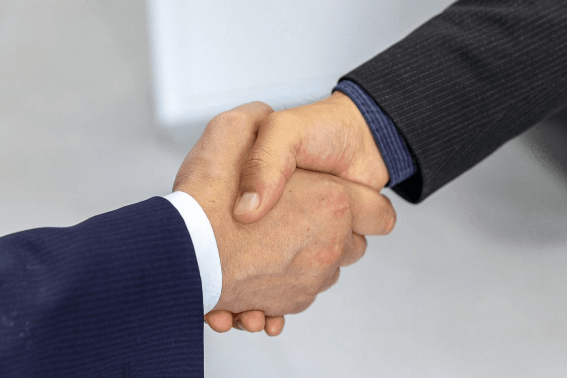 Handshake sealing an agreement
